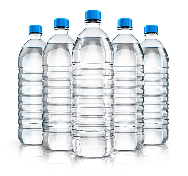 Five plastic water bottles with blue caps, filled with clear water.