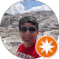 Man in sunglasses at Pamukkale's white terraces.
