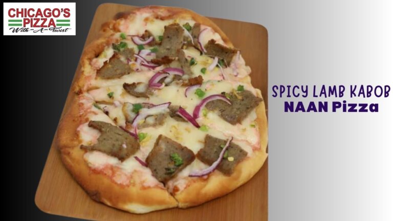 Spicy lamb kabob naan pizza with red onion and green garnish